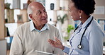 Healthcare, elderly patient and doctor with tablet for medical insurance information at clinic. Consultation, test results and geriatrician with senior man for good news on technology in office.