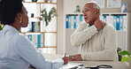 Elderly, man and consultation with doctor for healthcare with shoulder pain, body injury and discussion of symptoms. Senior, patient and medical professional in clinic for neck tension and support