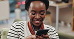 African woman, phone and smile in home living room with reading, update and meme with mobile app. Person, smartphone and happy on sofa for contact, notification and click for video, post and chat