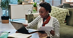 Laptop, documents and black woman in home for finance, budget review and mortgage payment. Happy, living room person on computer with paperwork for insurance, savings investment and financial bills