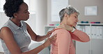 Senior, woman and physiotherapist with consultation for shoulder pain in clinic with healthcare or injury treatment. Physical therapy, medical expert or elderly patient with massage or rehabilitation