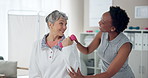 Weights, physical therapy and woman with mature patient for wellness, medical service and consulting. Healthcare, chiropractor and physiotherapist with person for rehabilitation, recovery or mobility