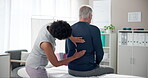 Senior, man and physiotherapist with consultation for back pain in clinic with healthcare or injury treatment on bed. Physical therapy, medical expert or mature patient with massage or rehabilitation