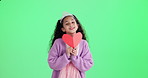 Face, child and love sign on green screen with happy review, crown and princess with icon for valentines day. Smile, tiara and girl kid with heart shape card with care, like emoji or kindness symbol