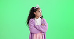 Angry, attitude and face of child on green screen with upset, mad and disappointed facial expression. Princess costume, youth and girl with body language for anger, tantrum and problem in studio