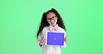 Girl, child and tablet in studio by green screen for tracking markers, application or ux by background. Kid, portrait and digital touchscreen in glasses, excited or formal fashion for business career