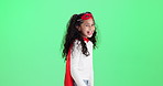 Girl, hero and kid with cape by green screen for smile, thinking and funny games by background. Child, happy and playful with mask, comic and fight crime in fantasy with superpower by mock up space