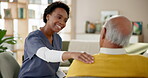 Caregiver, senior man and support with communication for helping hand, medical advice and rehabilitation healing . Elderly patient, nurse and discussion for healthcare, trust or consulting at house