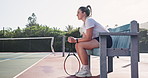 Sports, tennis and woman on court thinking of strategy for competition, tournament match and game. International athlete, fitness and person with racket for training, exercise and practice for event