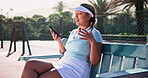 Tennis player, woman and talking with phone on court for voice recognition, speaker communication and recording. Sports, athlete or relax on bench with fitness training, game practice and mobile chat