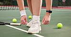 Person, tennis player and tying shoes with hands for game, match or sports on turf, court or outdoor pitch. Closeup of athlete tie laces in preparation or getting ready for challenge or competition