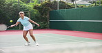 Woman, tennis and court with fitness, training and recreation with sunshine, exercise and contest. Person, outdoor and player with racket, practice and competition with hobby, activity and cardio