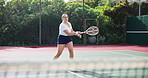 Woman, tennis and court with fitness, racket and training with sunshine, exercise and contest. Person, outdoor and player with energy, practice and competition with hobby, activity and recreation