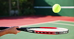 Hand, racket and bounce ball at tennis court for training, sports and development for competition. Person, athlete and outdoor for exercise, prepare and progress with balance, juggle and games