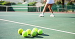 Tennis court, ball and ground for sport, outdoor and training with woman, legs and game at competition. Person, athlete and summer for exercise, gear and racket with running, challenge and contest