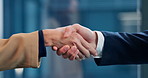 Hands, people and handshake at office for team building, collaboration and agreement. Business deal, greeting and partnership with unity with negotiation, opportunity and welcome with meeting