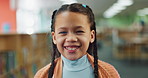 Happy girl, library and future with books for knowledge, education or information literacy at bookstore. Portrait of young female person, child or kid with smile for learning, ambition or academics