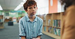 Answer, child and teacher with test, education and confused for preparation of exam, boy and shrug. School, questions and tutor with kid for learning of literature in library, listening and together