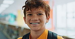 Happy boy, school and future with backpack for knowledge, education or information literacy at library. Portrait of young male person, teenager or child with smile or bag for learning or literature