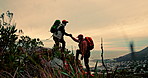 Climbing, helping and hike with senior friends outdoor in mountains together for exercise or hobby. Action, challenge and elderly with hiker men in nature for adventure, fitness or retirement