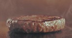 Cooking, patty and smoke with beef burger grilling in restaurant for cuisine, gourmet or meal. Eating, fast food and heat with raw protein in kitchen for meat preparation of take away order closeup