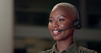 Computer, customer service and headset with woman in support office at night for consulting or feedback. Business, call center and sales representative with African agent at helpdesk in workplace