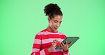 Tablet, internet and woman with smile by green screen for communication, website and networking. Happy, person and typing with tech in studio for insurance app, claim review or update of profile info