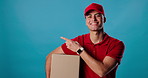 Advertising choice, face or delivery man in studio pointing to supply chain commercial, discount option or schedule. Distribution deal, mockup space and portrait of courier person on blue background