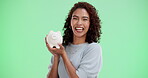 Woman, happy or piggy bank on green screen for portrait, travel savings or money on studio background. Smile, gen z girl or cash box on chroma key for investment plan, finance security or debt relief