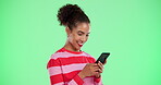 Phone, internet and woman with smile by green screen for dating app, platform and communication. Happy, person and typing with reply on technology for profile match, response and online conversation