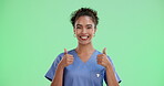 Caregiver, woman and thumbs up in green screen in studio for healthcare, medical service and confident. Nurse, female person and happy on portrait with pride for support, help and care with trust