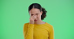 Green screen, stress and woman with headache, burnout and person on studio background. Mockup space, girl and model with migraine, health risk or temple massage with mockup space or sick with illness