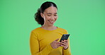 Green screen, smartphone and woman with smile for chat, text message and typing to online contact. Chromakey, mockup space and female person with phone for mobile app, networking and digital interact