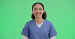 Happy, woman and face of doctor by green screen with pride for medical career growth support. Smile, confident and portrait of female cardiology healthcare worker from Brazil by chroma key background