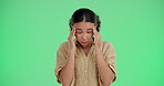 Creative woman, headache and pain on green screen, studio and stress of dizzy mind, mental health and brain fog. Frustrated female worker, migraine and anxiety of burnout, problems and fatigue face