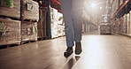 Person, warehouse and walk legs for work, logistics and distribution career with professional for whole sale company. Supply chain, steps and storage factory for shipping, safety boots and freight