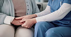 Senior woman, nurse and holding hands for support, healthcare and wellness on sofa with empathy. Elderly person, love and healing for mental health with geriatric worker, counseling and communication