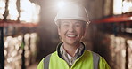 Portrait, woman and happy at warehouse as supervisor in manufacturing industry with pride and confidence. Female person, manager and smile for empowerment in logistics, supply chain and shipment
