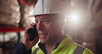 Businessman, helmet and safety with phone call in logistics for stock control or quality assurance at warehouse. Young man or employee talking on mobile smartphone in supply chain for cargo shipment