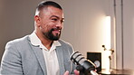 Interview, business and man with microphone on podcast or broadcast for youth empowerment and motivation. Guest, discussion and smile in online talk show or live streaming for career advice and tips