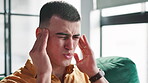 Man, face and headache in home from stress, head cold and mental health fatigue on sofa. Male person, discomfort and migraine in living room for crisis, dehydration or massage temples for pain relief