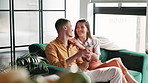 Phone, funny and happy couple in home for comedy, meme or reading email together to relax. Mobile, man and woman laugh on website for joke, online blog and social media on internet app in living room