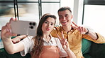 Selfie, smile and couple on sofa with peace sign for relax together in living room at home. Happy, goofy and young man and woman with photography picture for marriage, love and bonding in apartment.