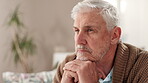 Depressed, mature man and walking stick in living room, house and disappointed with healing in rehabilitation. Nursing home, patient and person with disability in lounge, unhappy and thoughtful