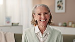 Portrait, laugh and happy senior woman in nursing home for relax, peace and funny. Face, retirement and elderly person in living room for calm, resting or break for wellness or health on sofa in USA
