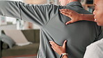 Senior, man and stretching with nurse in retirement home for fitness routine, activity and rehabilitation. Old person, caregiver and physical therapy for strength training and massage for support.