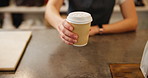 Takeaway coffee, hand and waitress for client, shop and sale as employee in cafe. Female person, barista and restaurant as small business, industry or working for order management or customer service