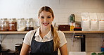 Portrait, woman and chef with tablet, kitchen and proud of culinary skills, confident and ready for cooking. Hotel, digital and employee in hospitality, happy and professional with apron for catering