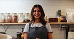 Portrait, woman and chef in kitchen, happy and proud of culinary skills, confident and ready for cooking. Hotel, business and employee in hospitality, smile and professional with apron for catering