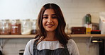 Portrait, woman and chef with smile, kitchen and proud of culinary skills, confident and ready for cooking. Hotel, cook and employee in hospitality, happy and professional with apron for catering